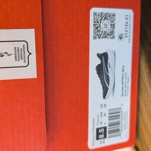 Puma Deviate NITRO 4 Athletic Shoes - Black and White